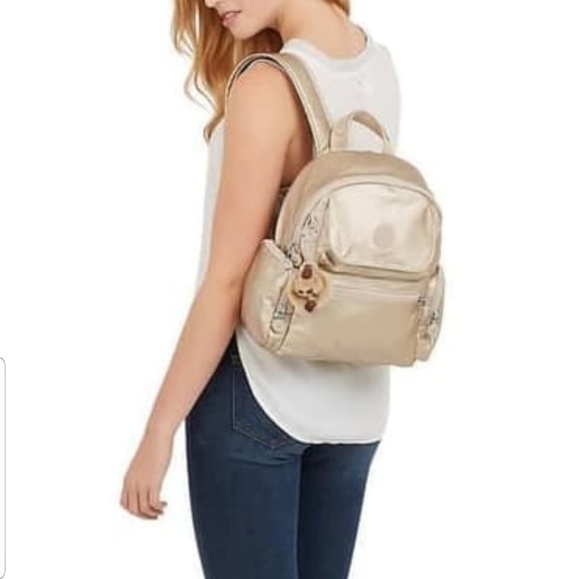 kipling rose gold backpack